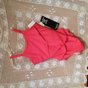 Pink one piece bathing suit.